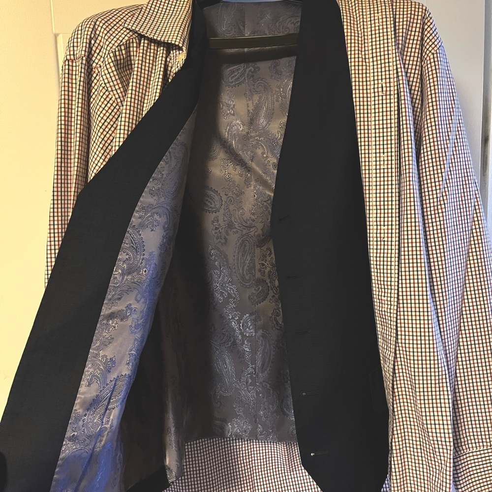 Suit jacketed with matching vest and dress shirt